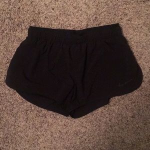 Black Nike running shorts